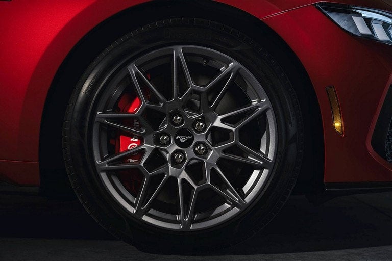 2024 Ford Mustang® model with a close-up of a wheel and brake caliper | Lundgren Ford in Eveleth MN